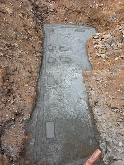 Levelling concrete poured in footing trench - Mr. Arjun project, RR Nagar