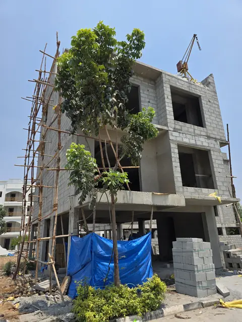 Scaffolding around the rising structure - Mr. Arjun project, RR Nagar