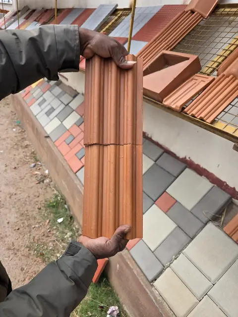 Clay roof tile held before fixing - Mr. Arjun project, RR Nagar