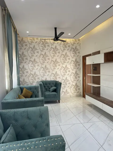 Lounge seating beside wooden display unit - Mr. Nagaraj project, Bangalore