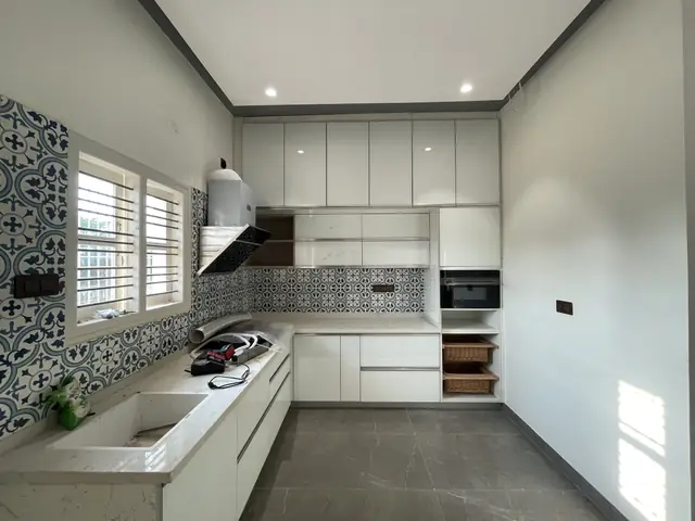 White modular kitchen with island counter - Mr. Nagaraj project, Bangalore