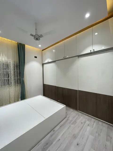 Bedroom with sliding wardrobe and bed - Mr. Nagaraj project, Bangalore