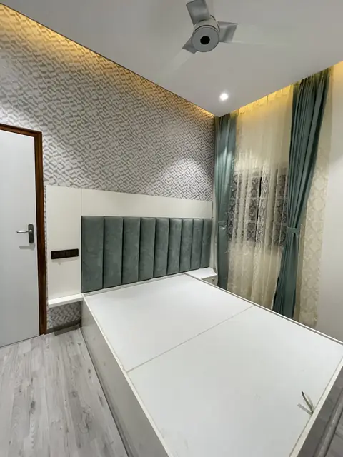 Bedroom with textured wallpaper and drapes - Mr. Nagaraj project, Bangalore