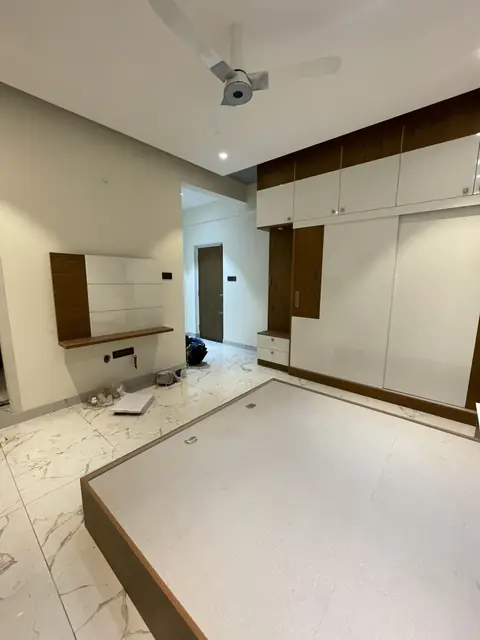 Bedroom joinery with mirrored wardrobe doors - Mr. Ranjith project, Bangalore