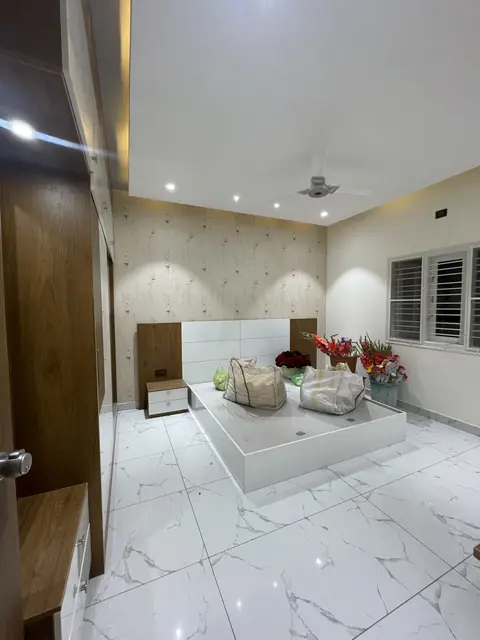 Living area seating under recessed lighting - Mr. Ranjith project, Bangalore