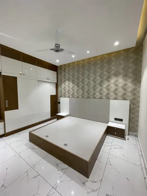 Bed and side tables against feature wall - Mr. Ranjith project, Bangalore