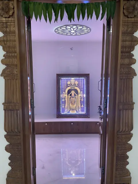 Pooja unit with decorated deity niche - Mr. Ranjith project, Bangalore