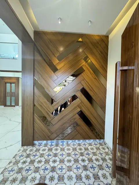 Entrance with herringbone timber cladding - Mr. Ranjith project, Bangalore