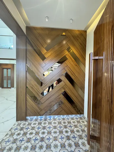 Patterned tile porch and timber cladding - Mr. Ranjith project, Bangalore