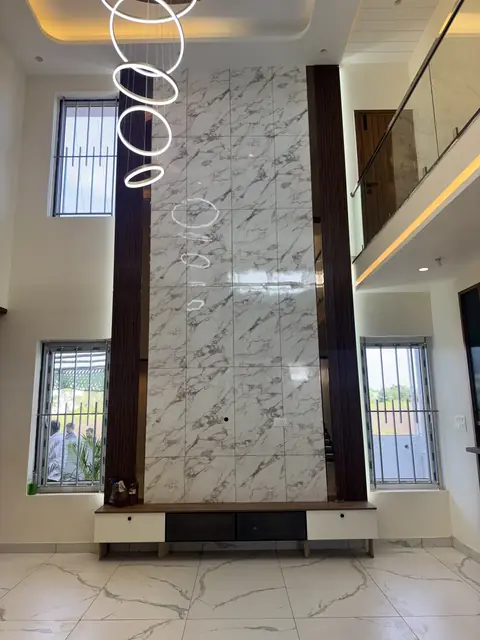 Double-height lobby with ring light feature - Mr. Ranjith project, Bangalore