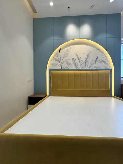 Bed against painted panelled feature wall - Mr. Ranjith project, Bangalore
