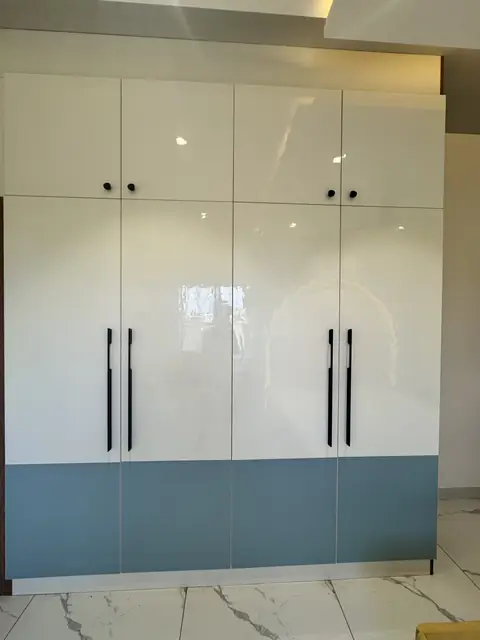 Full-height wardrobe with vertical handles - Mr. Ranjith project, Bangalore