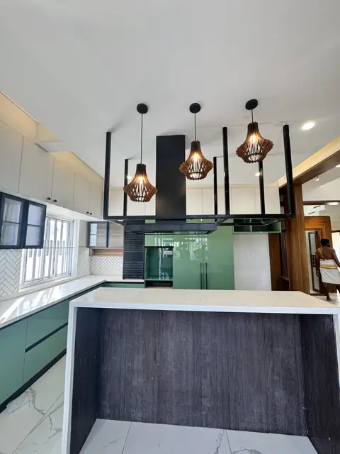 Island counter with green base units - Mr. Ranjith project, Bangalore