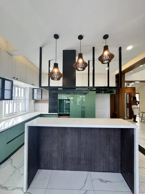 Kitchen island with pendant lights above - Mr. Ranjith project, Bangalore