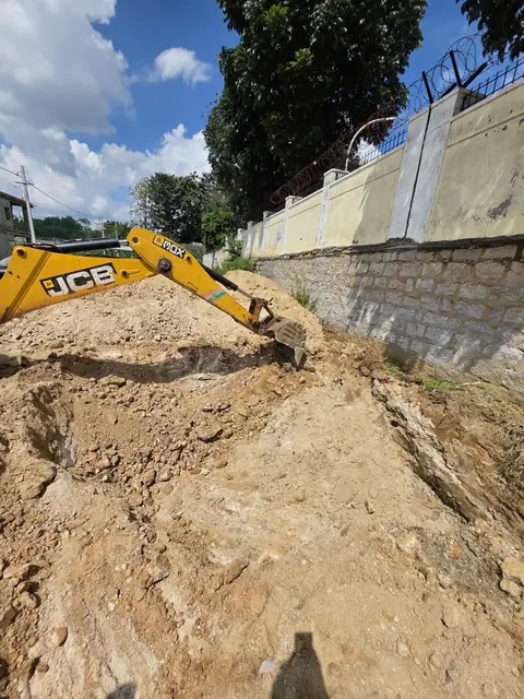 Excavator digging the foundation - Mr. Santosh project, Andrahalli