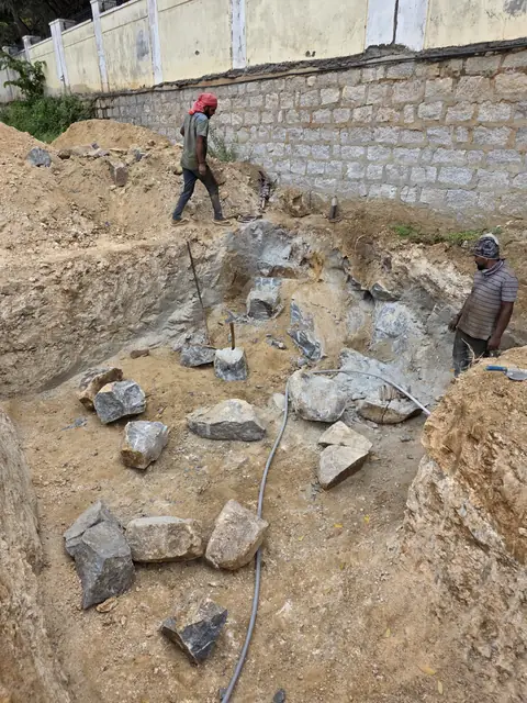 Excavated pit with broken rock - Mr. Santosh project, Andrahalli