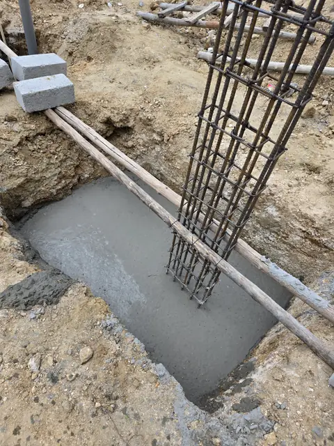 Timber-braced column cage on footing concrete - Mr. Santosh project, Andrahalli