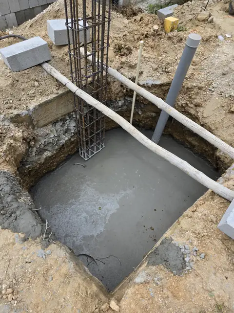 Column cage rising from concreted pit - Mr. Santosh project, Andrahalli