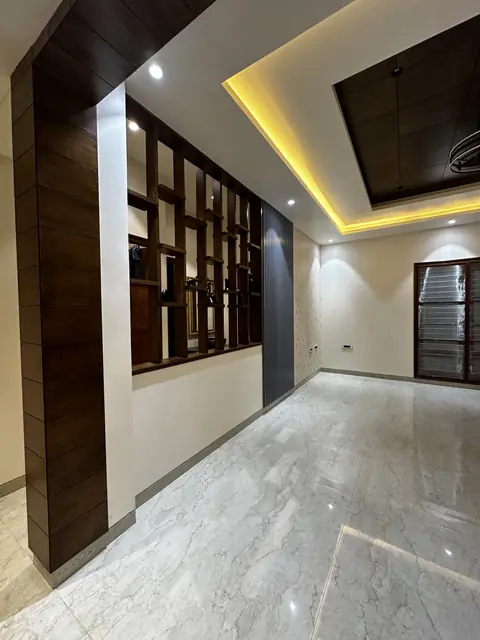 Corridor with wooden ceiling and jaali screens - Mr. Siddanth project, Bangalore