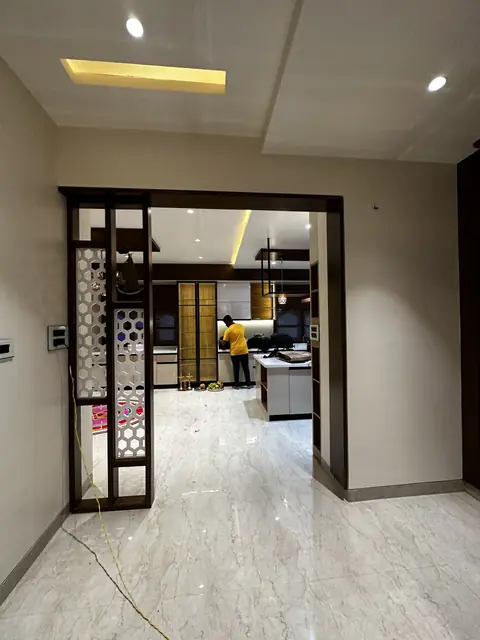 Framed partition doorway toward kitchen - Mr. Siddanth project, Bangalore