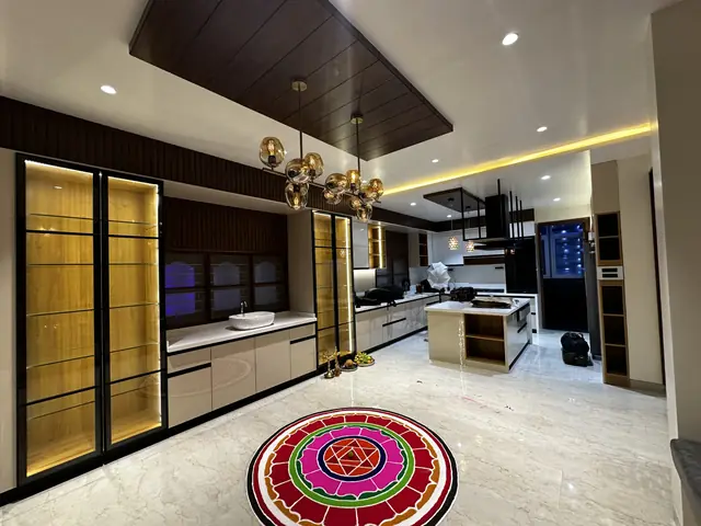 Long kitchen view with rangoli floor - Mr. Siddanth project, Bangalore