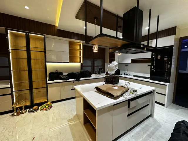 Kitchen island beside glass-fronted partition - Mr. Siddanth project, Bangalore