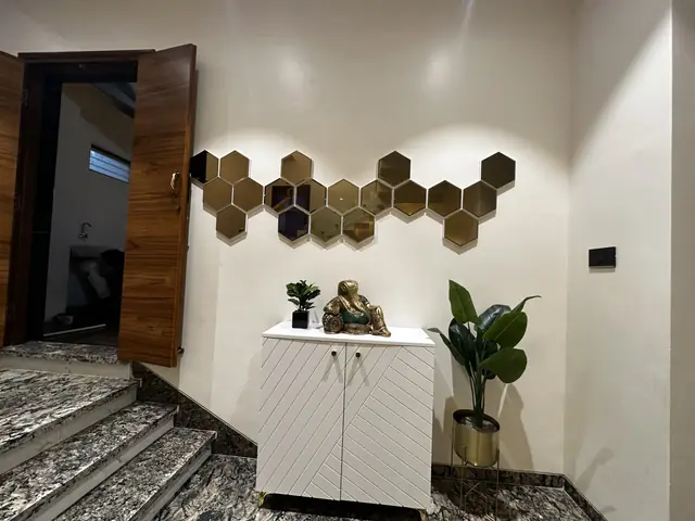 Console unit below hexagonal wall panels - Mr. Siddanth project, Bangalore