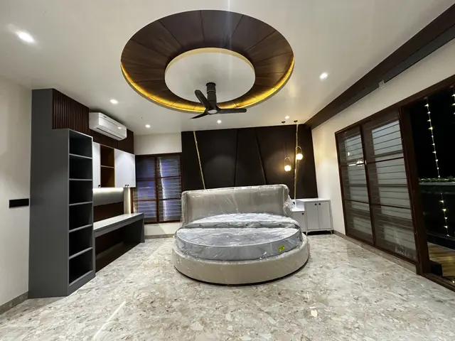 Master bedroom with round bed and wardrobes - Mr. Siddanth project, Bangalore