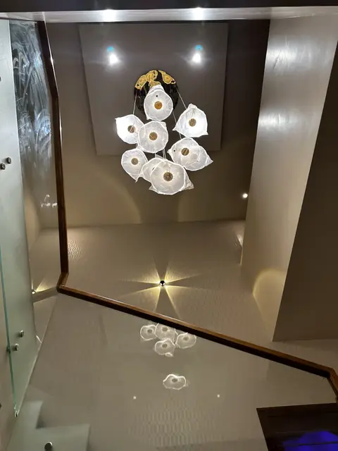Stairwell chandelier over polished flooring - Mr. Siddanth project, Bangalore