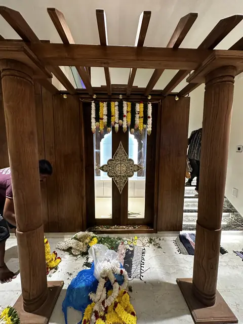 Timber-pillared pooja mandapam with garlands - Mr. Siddanth project, Bangalore