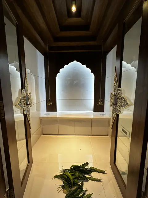 Pooja room arch with wooden columns - Mr. Siddanth project, Bangalore