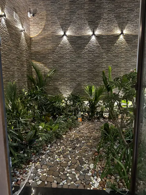 Landscaped courtyard with wall lighting - Mr. Siddanth project, Bangalore