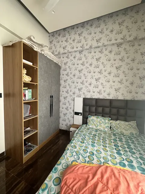 Bedroom wardrobe beside the bed - Mr. Siddanth project, Bangalore