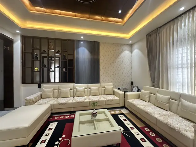 Living room with sectional sofa and rug - Mr. Siddanth project, Bangalore