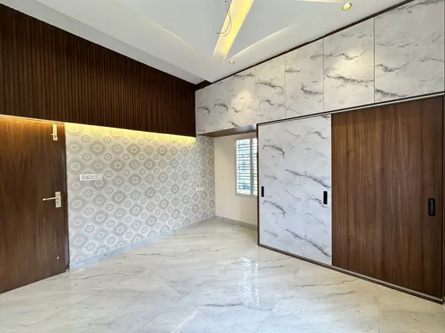 Bedroom with sliding wardrobe and panelling - Mr. Umesh project, Bangalore