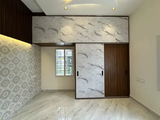 Wardrobe wall with loft storage above - Mr. Umesh project, Bangalore