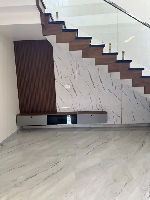 Under-stair television unit with fluted panel - Mr. Umesh project, Bangalore