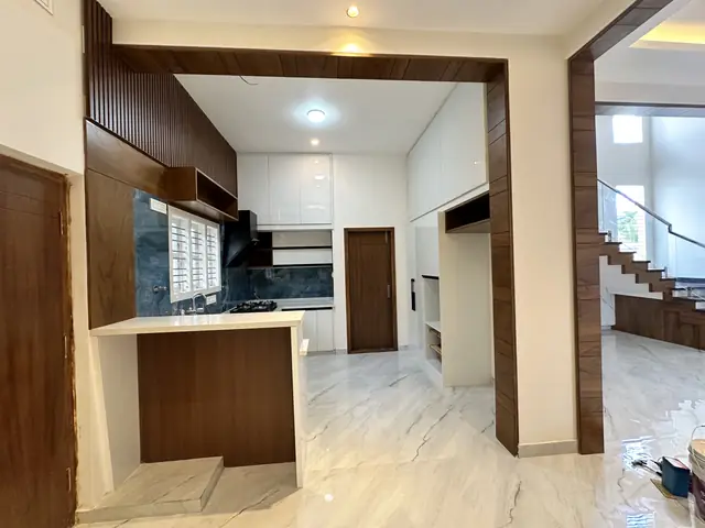 Open kitchen with breakfast counter and portal - Mr. Umesh project, Bangalore