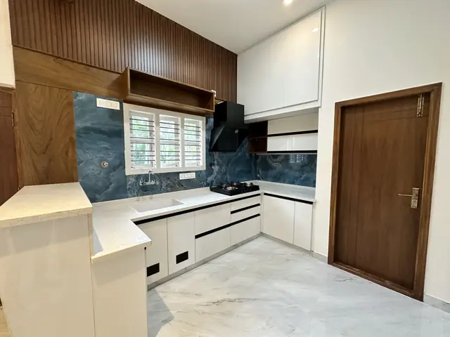 Modular kitchen with stone backsplash - Mr. Umesh project, Bangalore