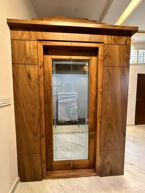 Lift door with wooden frame and cornice - Mr. Umesh project, Bangalore