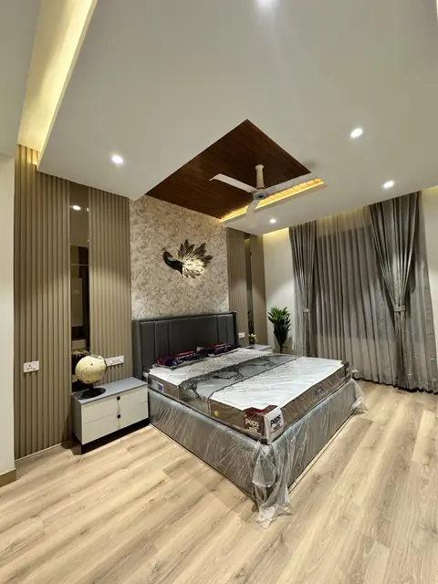 Bedroom with panelled wall and cove lighting - Mr. Willfred project, Bangalore