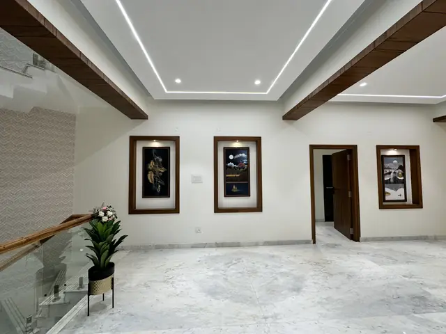 Finished lobby with framed art and doors - Mr. Willfred project, Bangalore