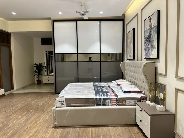 Bedroom wardrobe wall with framed artwork - Mr. Willfred project, Bangalore