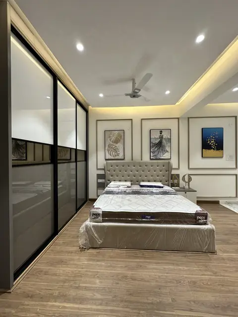 Bedroom viewed through glazed partition doors - Mr. Willfred project, Bangalore