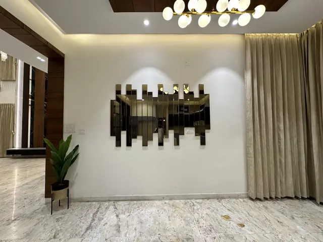Living area with cluster chandelier and mirror - Mr. Willfred project, Bangalore