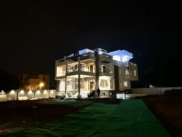 Night view of the three-level exterior - Mr. Willfred project, Bangalore