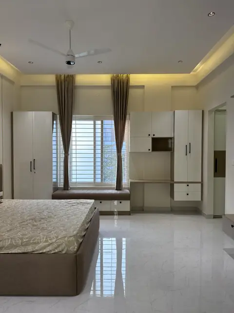 Bedroom with wardrobe and curtained window - Mrs. Anitha project, Bangalore