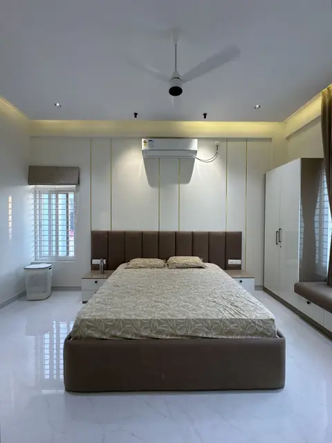 Bedroom with bed, wardrobe and window - Mrs. Anitha project, Bangalore