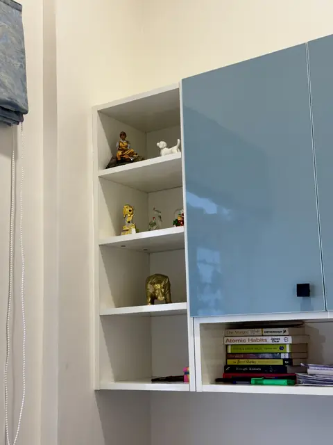 Open display shelving beside gloss cabinet - Mrs. Anitha project, Bangalore