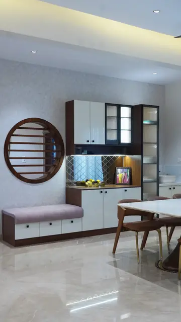 Dining area with circular window and seat - Mrs. Anitha project, Bangalore